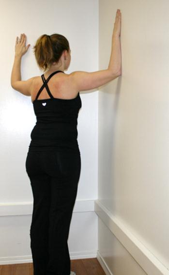 6. CORNER CHEST STRETCH Begin by standing facing a corner of a room. Place your forearms on the each side of the wall (as shown in the far left hand photo).