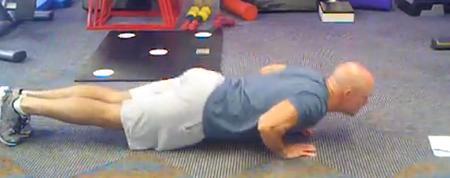 Close-grip Pushup Keep the abs braced and body in a straight line from toes/knees to shoulders.