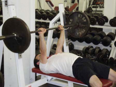 Finishers 1-4 BB Bench Press Keep your feet flat on the floor, legs bent, and upper back flat against the