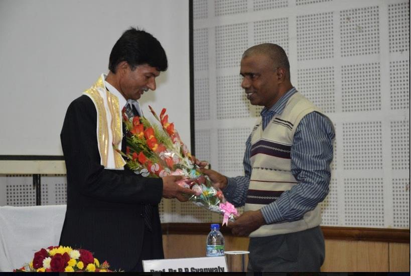 Dr. A. Ranganath, Registrar, ICFAI University, Tripura felicitates Dr.