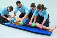 Skill 24-1: Placing Patient on Long Board - Log Roll On command from EMT at head,