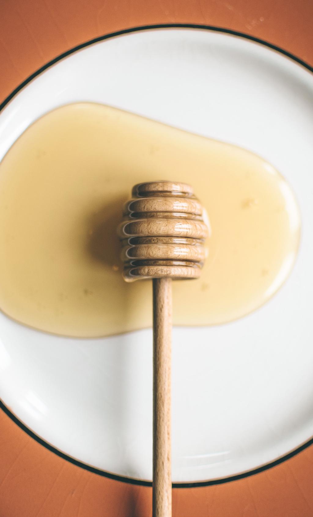 eight eat local, raw honey A spoonful of local raw honey significantly reduces symptoms of seasonal allergies. This is due to the ingestion of local pollen that is contained in the honey.