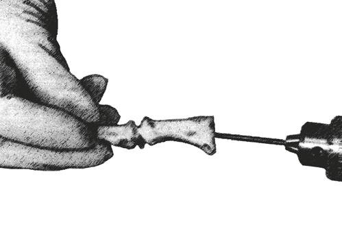 Drive the Phalangeal Guide Pin into the shaft of the proximal phalanx, taking care not to penetrate the IP joint.