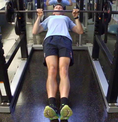 Page 18 of 21 SUPINE RACK PULL - This exercise can be done on any fixed equipment. - Grip the bar with an overhand (pronated) grip, with the hands at approximately shoulder width apart.