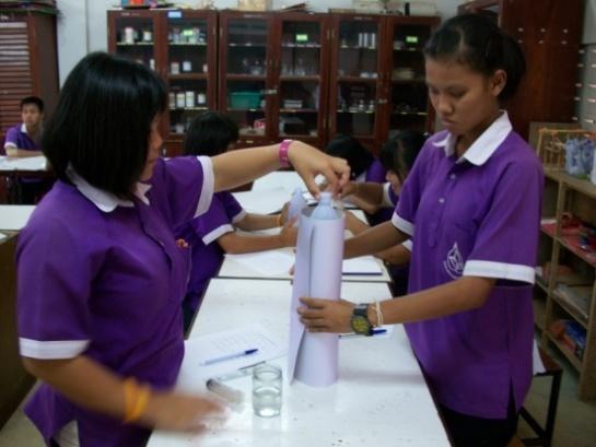 Fill your bottle with the amount of water as assigned by the teacher. Then measure the mass on the electronic scale. 2. Roll the paper into a cylinder and tape it together.