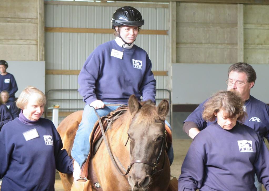 Jamie on Boo with Volunteers Tink, Dave and Heidi at the Fall Horse Show. From Jill Pohl, mother of TRI Student, Jamie Pohl: We ve been riding with TRI since 2001.