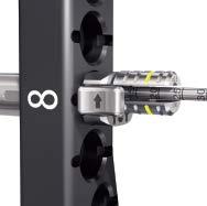 Proper screw length can be determined from the calibration on the drill bit aligned with the top of the drill guide.