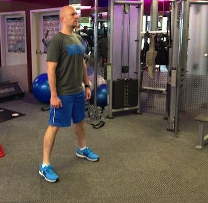 Alternate sides and repeat Bodyweight Squat Stand with your feet just greater than shoulder-width