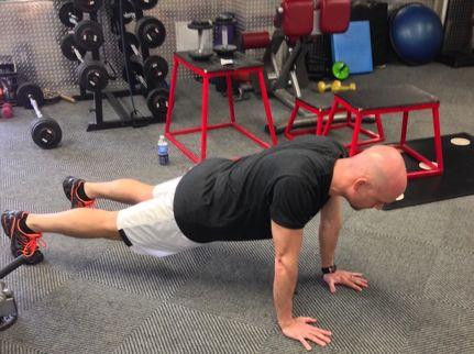 Hand Walk-out Assume the pushup position with your arms extended Maintaining a straight line, walk your hands out in