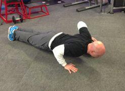 Drop your back knee just above the ground and bend your front knee as well, keeping your upper body straight.