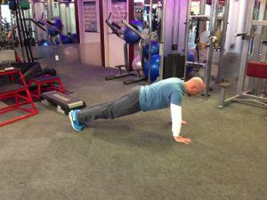 T Pushup Keep the abs braced and body in a straight line from toes to