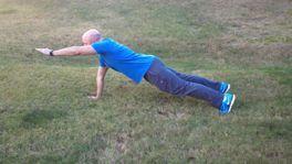 Bodyweight Death Crawl Start in a push-up position.