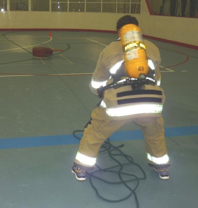 3. HIGH VOLUME HOSE PULL TEST You must pull a roll of fire hose weighing approximately 56kg (123 lb) a distance of fifty feet (50 ft.