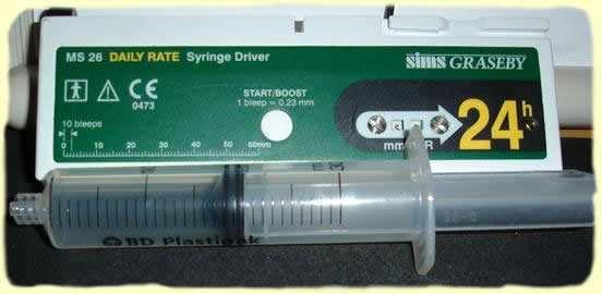 Page 2 of 8 Syringe driver (Graseby MS26) Protective plastic cover Carrying holster 9 volt battery (spare battery should also be available) Rate adjusting key (or paper clip) Appropriately sized luer