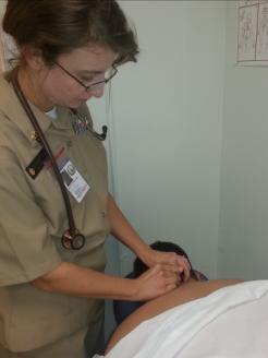 P A G E 8 Acupuncture As Adjunctive Medical Therapy LCDR Faye Rozwadowski practices acupuncture on a patient in Lakehurst, NJ.