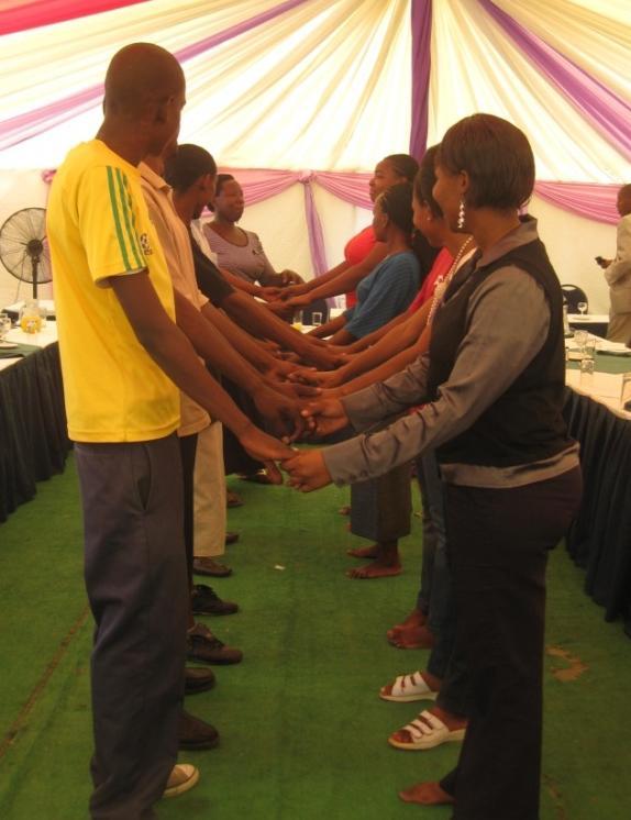 Boitshwarelo Tutwane leads participants in an activity to demonstrate the networks formed by MCP. the group.