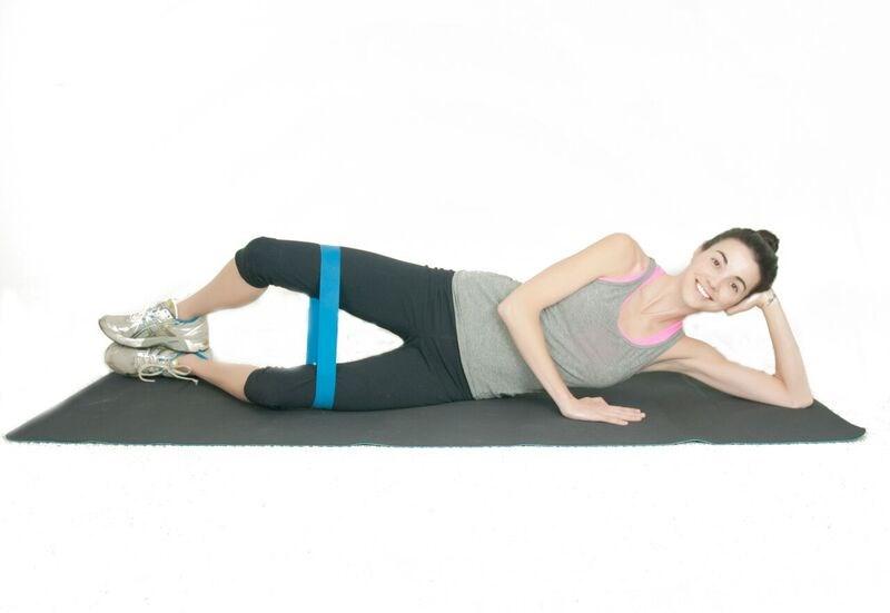 CLAMS (BEGINNER) Step 1: Place the resistance band around your thighs, just above your knees.