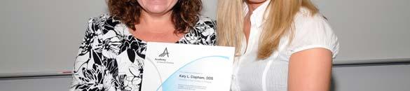 (Above): Ms. Katy Clapham receives the Academy of General Dentistry Senior Student Award from Dr.