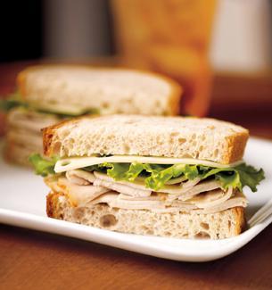 Sandwich: 2 slices wheat bread, lowsodium deli turkey, American cheese, lettuce/tomato,