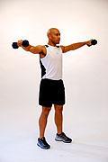 Perform dumbbell squat (for description see squat dumbbell in the Exercise Library).