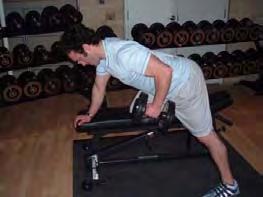 Hold the dumbbell in the right hand in full extension and slowly row it up to