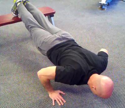 shoulders. Place the hands on the floor slightly wider than shoulder-width apart.