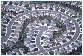 Suburban design discourages walking and increases reliance on cars Large lot sizes (more sprawl) Less