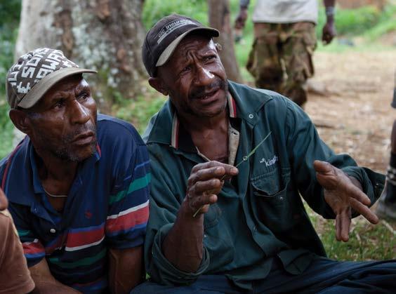 Some of the 200 men who waited to have a vasectomy outside a Marie Stopes mobile clinic in PNG. Photo by Tom Greenwood.