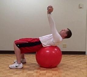 Core Exercises Ball Crunch (with weight) Coaching Tips: Find a medium sized stability ball, place your feet hip width and flat on