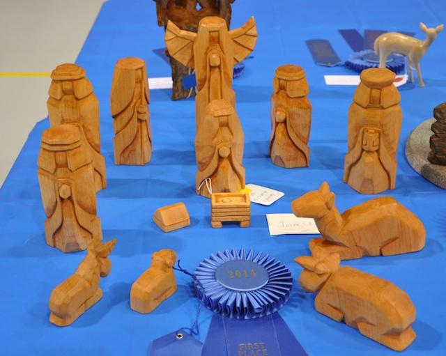 2015 SCULPTURES AND DESIGNS IN WOOD QUESTION: HOW DO YOU PAY FOR AN ANNUAL SHOW?