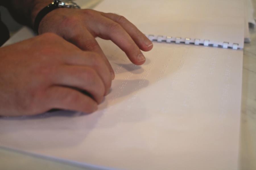 Braille Braille is a system of reading and writing that is used by blind and low vision people.