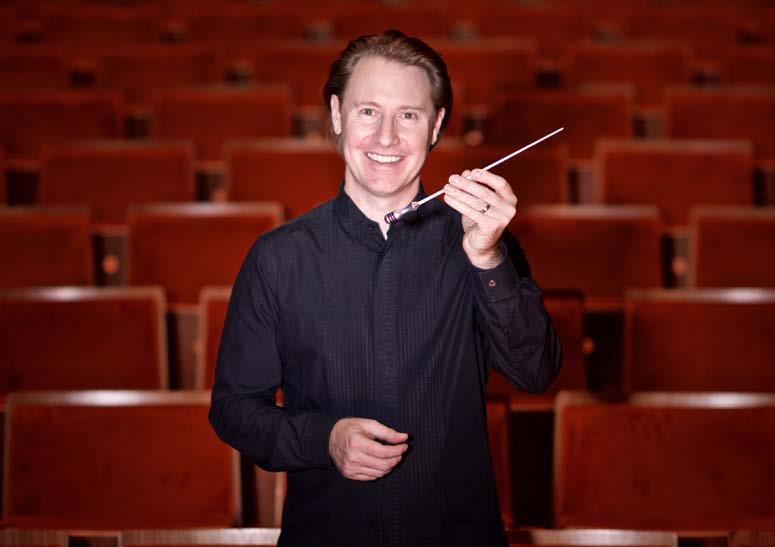 This is a picture of Ben. Ben is the Conductor. His job is to keep everyone in time by moving his arms and body along to the music.