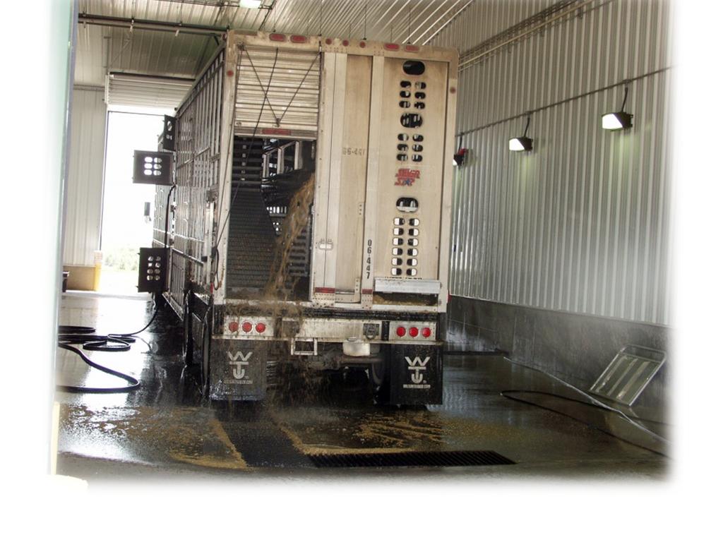 After hauling pigs to markets, sales or auction barns, wash and disinfect vehicles before returning to