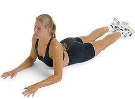 With the lower body firmly on the floor, begin to arch from the head and neck, extending the arch