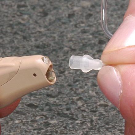 Remove the dome flex-tip from the poly-tube by gently twisting the poly-tube and pulling the dome tip.