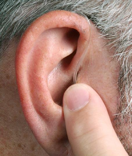 Gently push in the dome flex tip into your ear canal until the polytube is flush with the outer ear (Fig. 2).