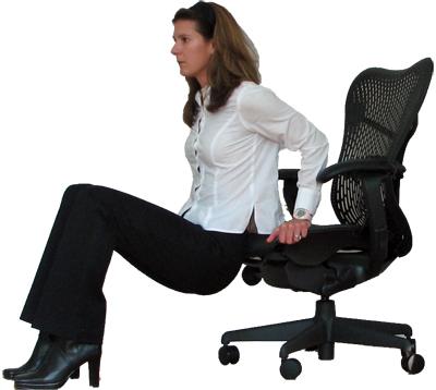 the support of your arms by holding the edge of the chair, now, push yourself up and again lower