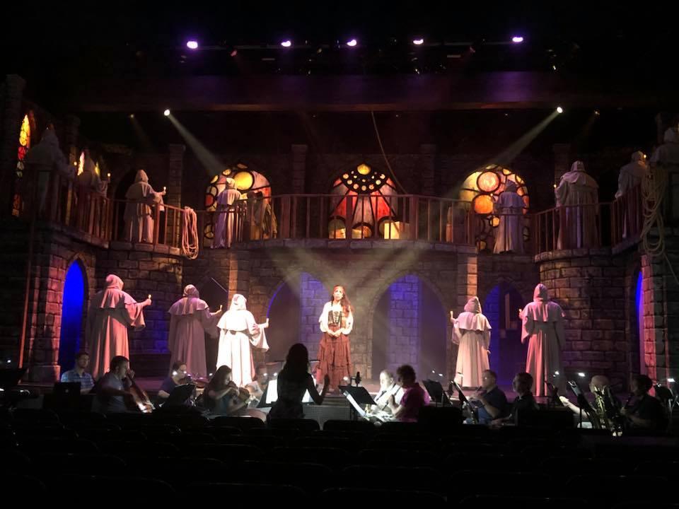 We were thrilled that same season to produce the State College premier of Disney s The Hunchback of Notre Dame, a massive work requiring a cast of 20, a separate choir of 32, an orchestra of 16, and