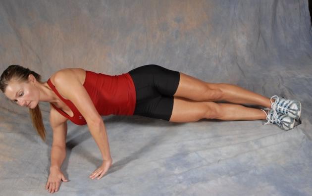29 Side Plank to Arm Raise - Lie on one side with your legs extended and elbow directly underneath your shoulder.