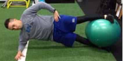 Careful not to lean forward or backward. Add Physioball (PBall) and Leg Abduction for added difficulty.
