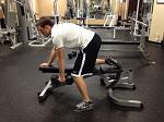 Lower the dumbbells under control to chest level. Press the dumbbells back up above your chest.