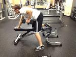 With a dumbbell in your right hand, squeeze your shoulder blade back and row the weight up to your
