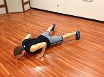 Abs Hold Start in the pushup position with your hands underneath your shoulders.