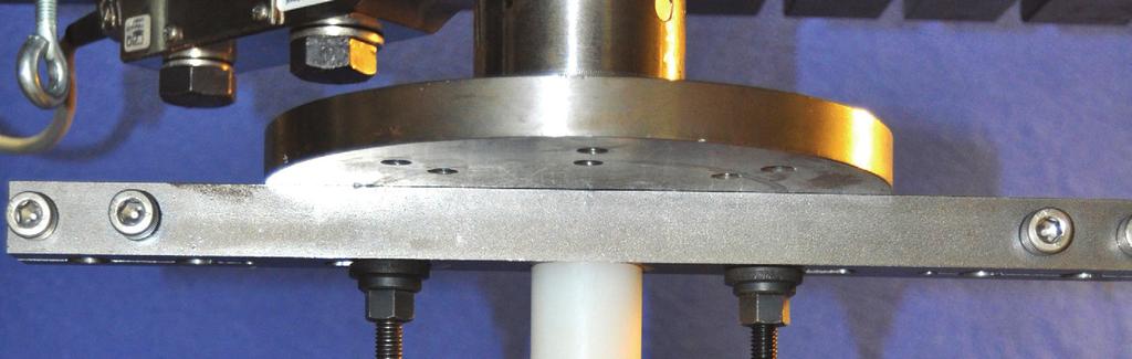 The picture detail displays a close-up view of one of the two displacement transducers used to measure slippage Our own tests of