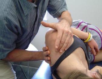 Scapular-Thoracic Motion Assessment - Patient Positioning: Side lying towards the back edge of the bed - Therapist Positioning: Standing behind the patient with both hands on the