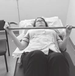 External rotation with a stick Lying on your back with a folded towel under the operated arm with the elbow bent to 90 degrees with a stick held in your hands (as per photo).
