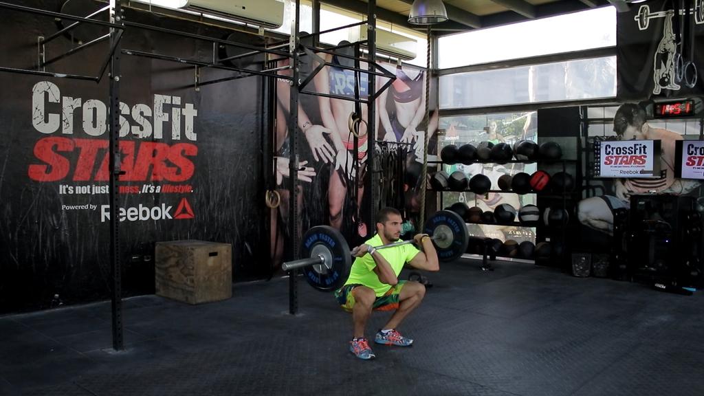 Thrusters: The barbell moves from the bottom of a front squat to full lockout overhead in one motion. No jerks allowed. The bar starts on the ground. No racks allowed.