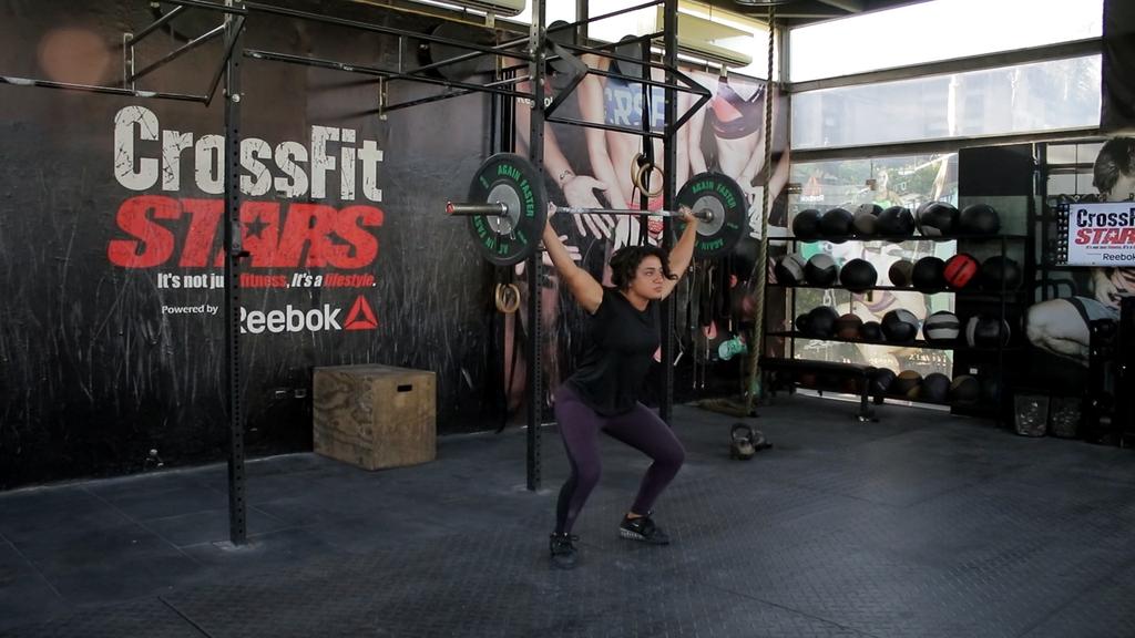 Snatch: The barbell starts on the ground and goes overhead in one motion.