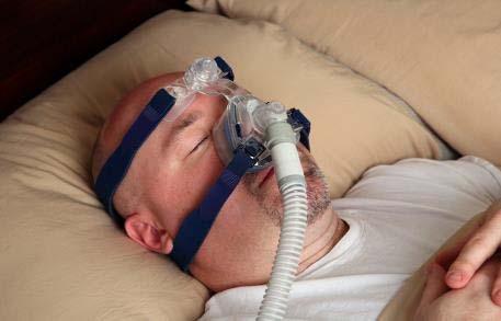 TO HELP YOU BREATHE This person is wearing a mask over his face called a CPAP mask. This helps a person to breathe be er when they sleep.