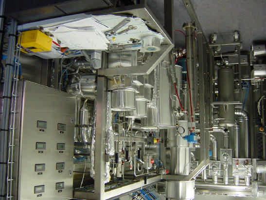 a Figure 3. The reactors, the flash drum and the bottom of the distillation column in the pilot plant at Härröd Research.